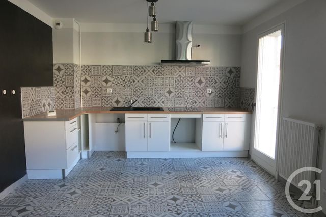Afficher la photo en grand Appartement F3 à louer - 3 pièces - 73.86 m2 - MONTLUCON - 03 - AUVERGNE - Century 21 Pasquet Immobilier