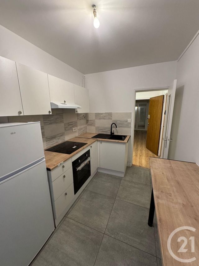 Appartement F4 à vendre - 4 pièces - 66.62 m2 - MONTLUCON - 03 - AUVERGNE - Century 21 Pasquet Immobilier