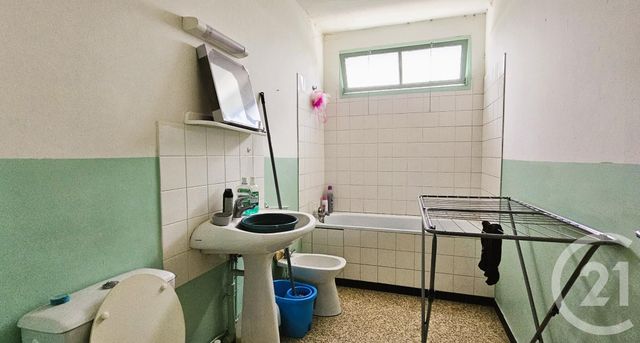 Appartement F2 à vendre - 2 pièces - 46.47 m2 - COMMENTRY - 03 - AUVERGNE - Century 21 Pasquet Immobilier