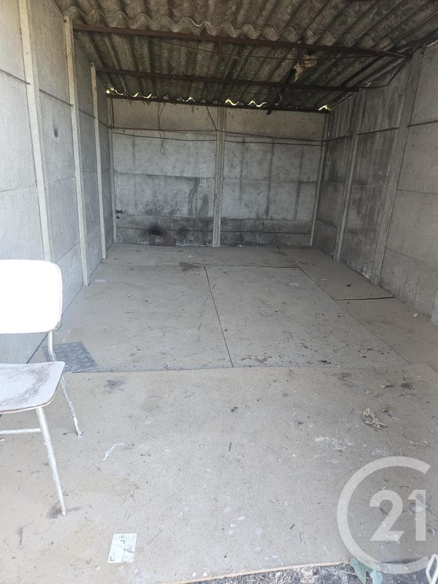 Afficher la photo en grand parking à louer - 16.5 m2 - MONTLUCON - 03 - AUVERGNE - Century 21 Pasquet Immobilier